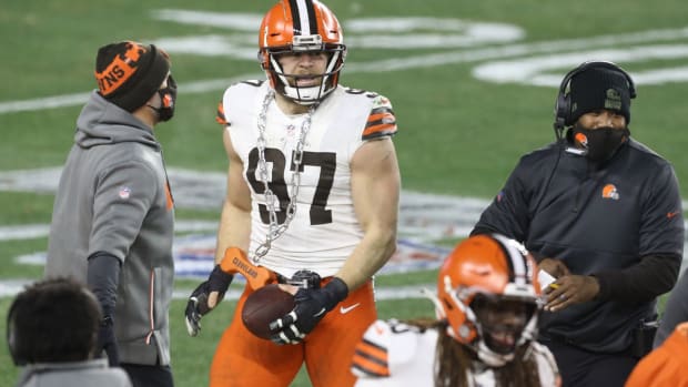 Jan 10, 2021; Pittsburgh, PA, USA; Cleveland Browns defensive end Porter Gustin (97) celebrates an interception against the Pittsburgh Steelers in the second quarter of an AFC Wild Card playoff game at Heinz Field. Mandatory Credit: Charles LeClaire-USA TODAY Sports